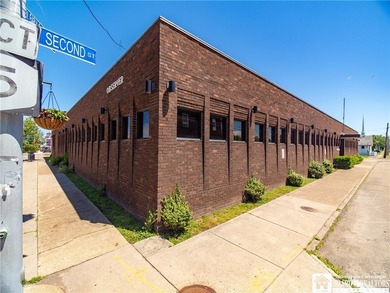 Large well maintained brick building with ample parking situated - photo 40