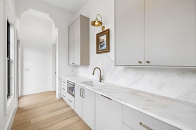 Discover refined coastal living in this stunning custom-designed - photo 40