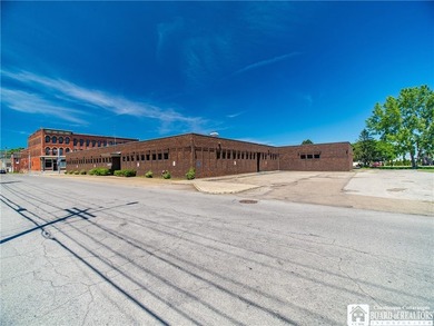 Large well maintained brick building with ample parking situated - photo 43