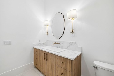Discover refined coastal living in this stunning custom-designed - photo 46
