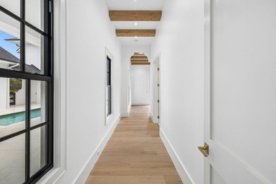 Discover refined coastal living in this stunning custom-designed - photo 48
