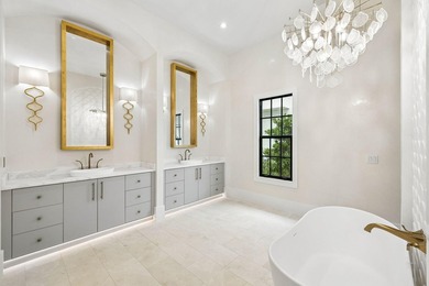 Discover refined coastal living in this stunning custom-designed - photo 49