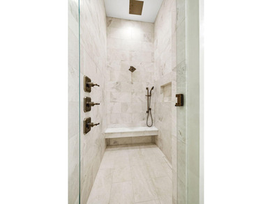 Discover refined coastal living in this stunning custom-designed - photo 53