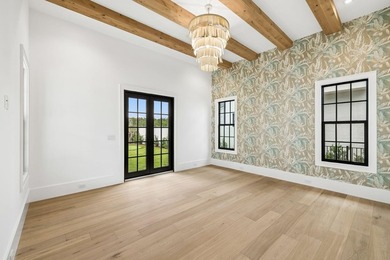 Discover refined coastal living in this stunning custom-designed - photo 56