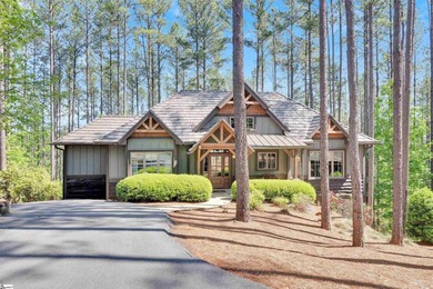 Tucked away in a peaceful, wooded cul-de-sac, this beautifully - photo 1