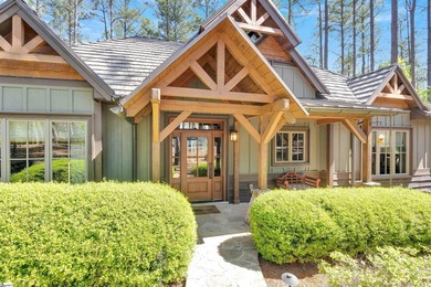 Tucked away in a peaceful, wooded cul-de-sac, this beautifully - photo 2