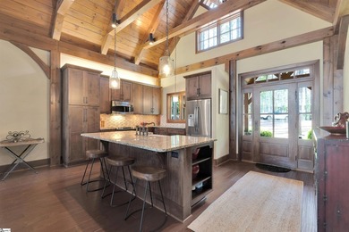 Tucked away in a peaceful, wooded cul-de-sac, this beautifully - photo 3