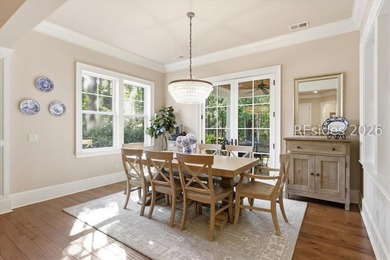 Hampton Lake is a gated community in Bluffton, centered around a - photo 17