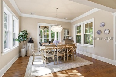 Hampton Lake is a gated community in Bluffton, centered around a - photo 18