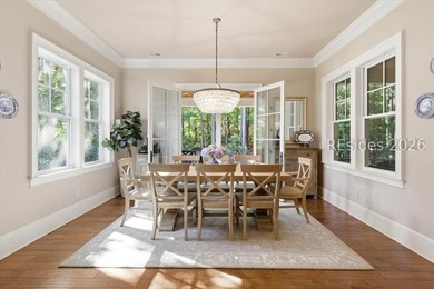 Hampton Lake is a gated community in Bluffton, centered around a - photo 19