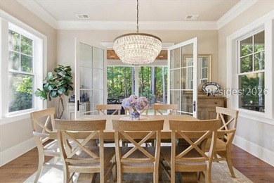 Hampton Lake is a gated community in Bluffton, centered around a - photo 20