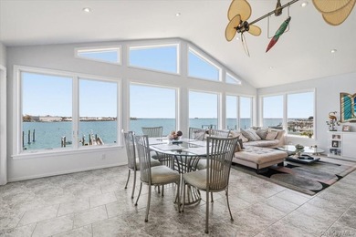 Experience the pinnacle of waterfront living at this spectacular - photo 4