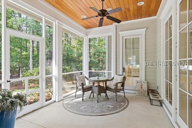 Hampton Lake is a gated community in Bluffton, centered around a - photo 26