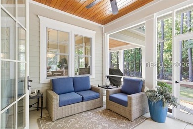 Hampton Lake is a gated community in Bluffton, centered around a - photo 27