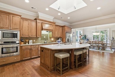 Hampton Lake is a gated community in Bluffton, centered around a - photo 28