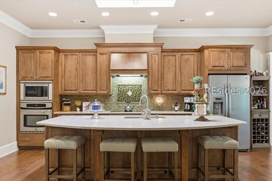 Hampton Lake is a gated community in Bluffton, centered around a - photo 29