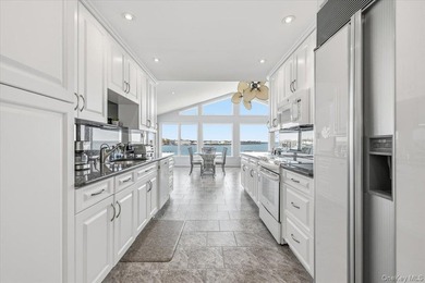Experience the pinnacle of waterfront living at this spectacular - photo 10