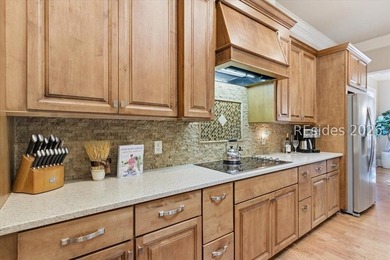 Hampton Lake is a gated community in Bluffton, centered around a - photo 32