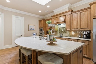 Hampton Lake is a gated community in Bluffton, centered around a - photo 35