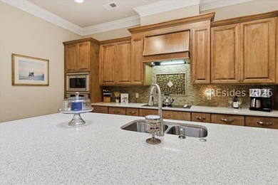 Hampton Lake is a gated community in Bluffton, centered around a - photo 36