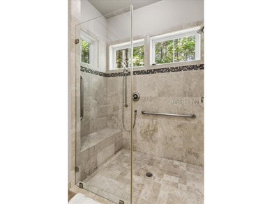 Hampton Lake is a gated community in Bluffton, centered around a - photo 45