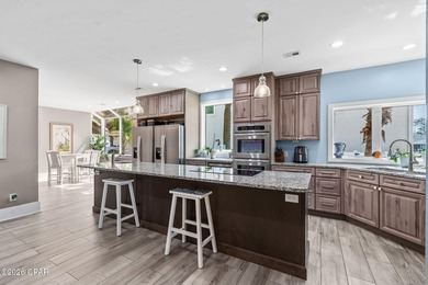 Step into refined coastal luxury with this extraordinary - photo 16