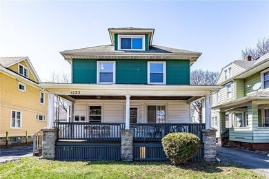 This two-family home offers a fantastic investment or - photo 2