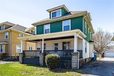 This two-family home offers a fantastic investment or - photo 3