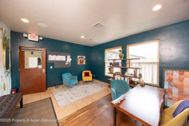 Own the light and bright end-unit of this well known office