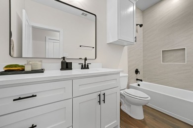 This stunning 2024-built home perfectly blends modern style - photo 22