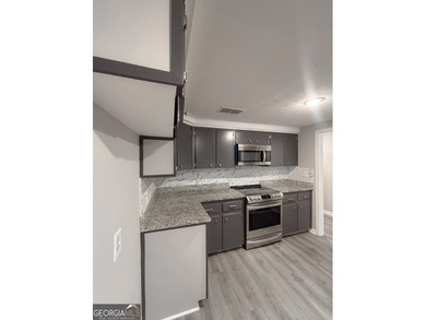 Welcome home to this spacious, move-in ready 4-bedroom, 2.5-bath - photo 27