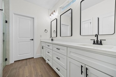 This stunning 2024-built home perfectly blends modern style - photo 28