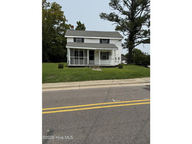 Home in town on nice corner lot with front porch! Large eat-in - photo 1