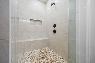 This stunning 2024-built home perfectly blends modern style - photo 32