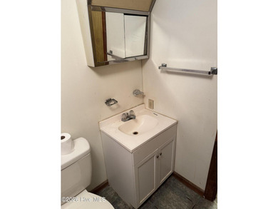 Home in town on nice corner lot with front porch! Large eat-in - photo 5