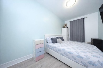 Introducing this rare, large full-brick two-family home located - photo 22