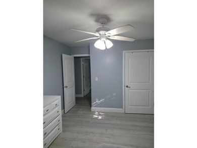 This lovely home offers 3 bedrooms and 2 baths, with a welcoming - photo 11