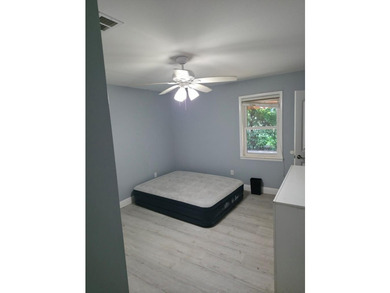 This lovely home offers 3 bedrooms and 2 baths, with a welcoming - photo 12
