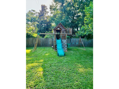 This lovely home offers 3 bedrooms and 2 baths, with a welcoming - photo 21