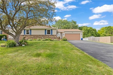Updated 3 bedroom and 1.5 bath ranch offering the ease and - photo 2