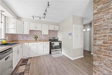 Updated 3 bedroom and 1.5 bath ranch offering the ease and - photo 7