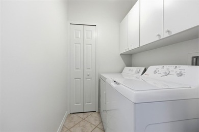 Welcome to easy coastal living in the highly sought-after gated - photo 31