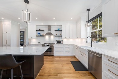 Newly built and beautifully enhanced with approx. $300K in - photo 6