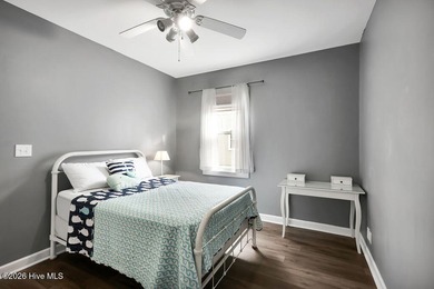 This desirable end-unit condominium offers a light-filled layout