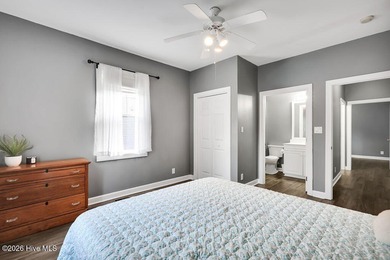 This desirable end-unit condominium offers a light-filled layout