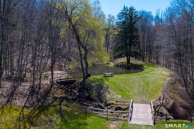 Set on over 20 breathtaking, wooded acres, this property offers - photo 31