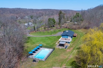 Set on over 20 breathtaking, wooded acres, this property offers - photo 33