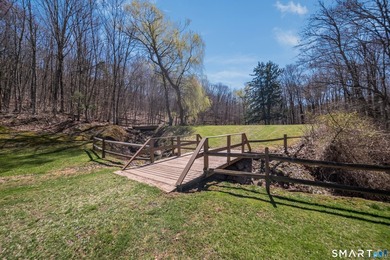Set on over 20 breathtaking, wooded acres, this property offers - photo 35