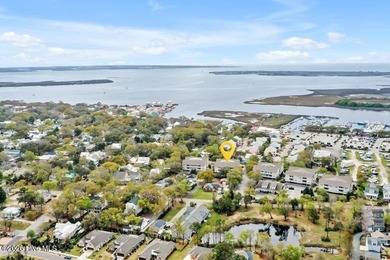 This desirable end-unit condominium offers a light-filled layout