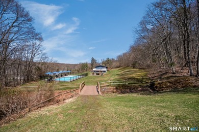 Set on over 20 breathtaking, wooded acres, this property offers - photo 37